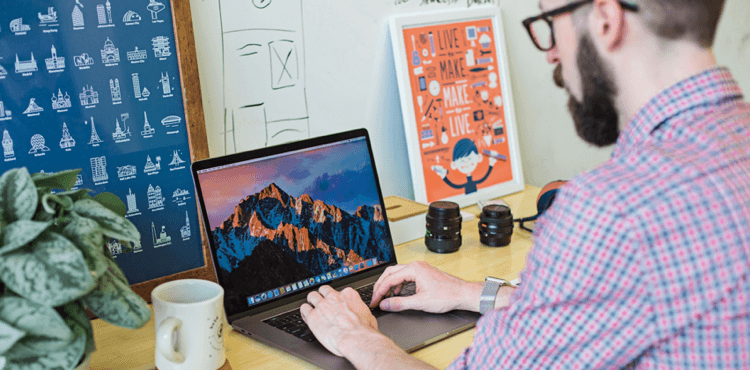 Man working on laptop doing seo